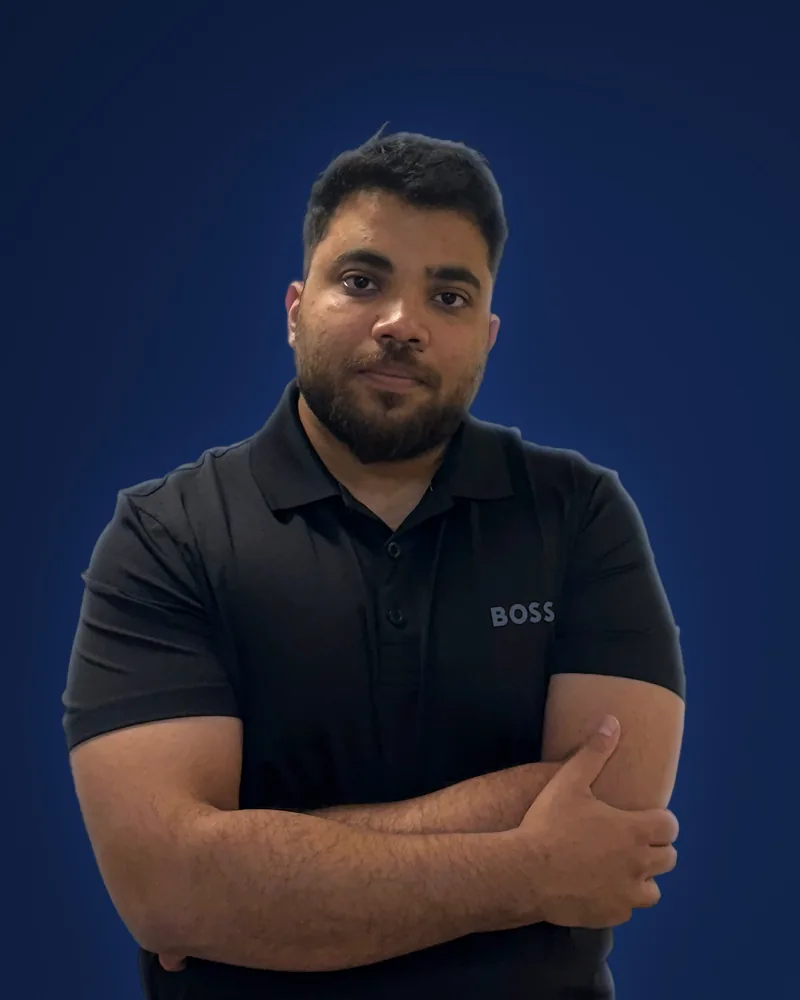 Hasan M. H., founder of Nexis365, standing with his arms crossed